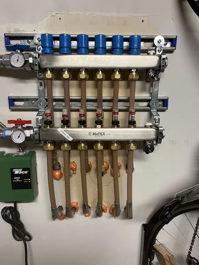 Plumber performing Gas Line Installation at a residential property in Merrimac